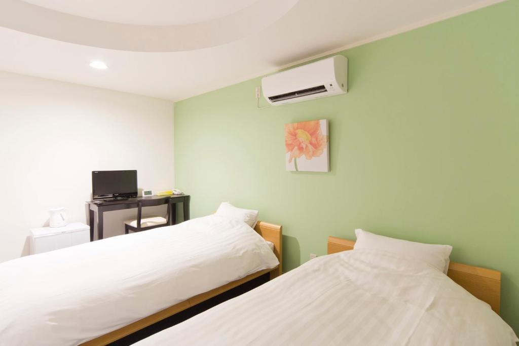 Shin-Okubo City Hotel Tokio Habitación foto
