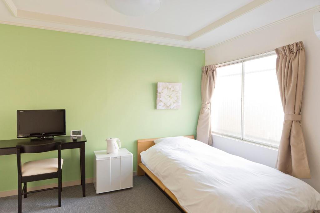 Shin-Okubo City Hotel Tokio Habitación foto